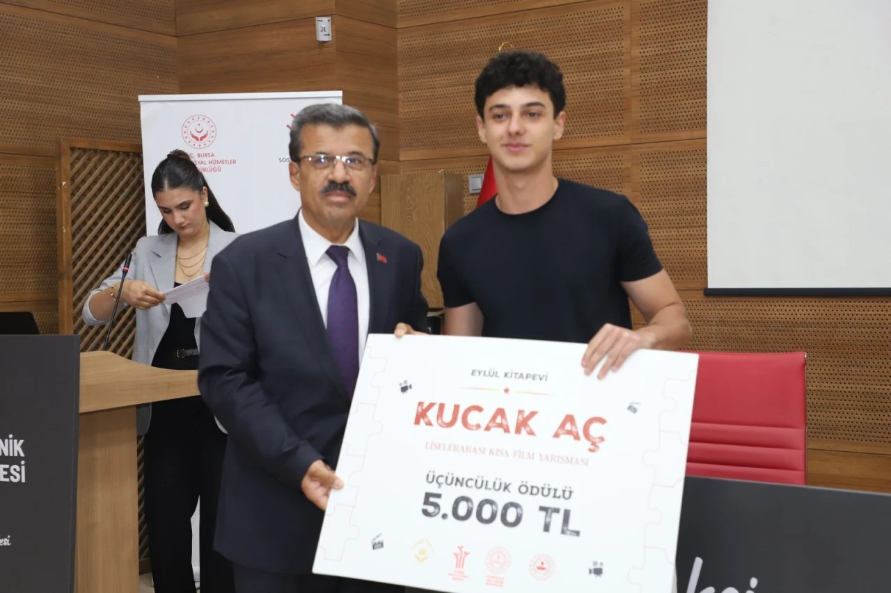“Kucak Aç