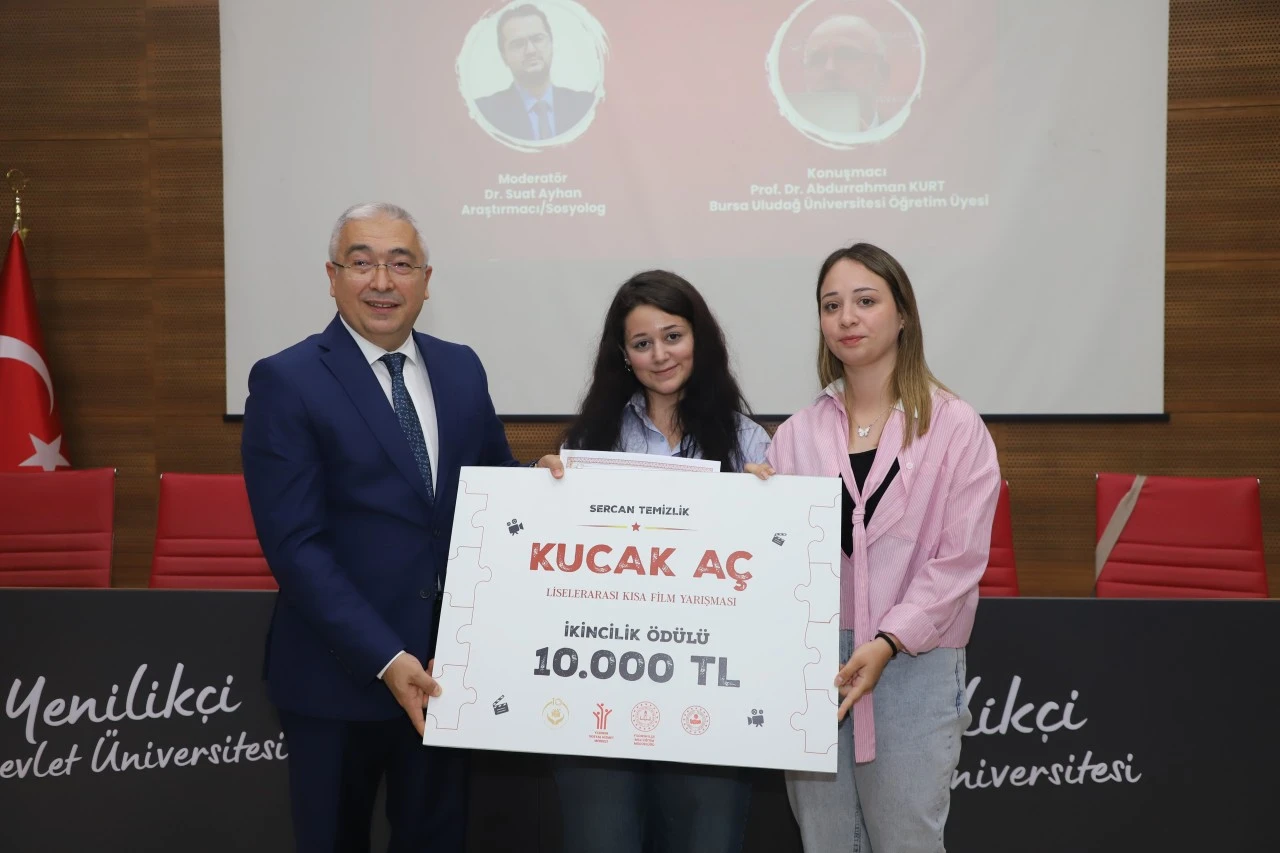 “Kucak Aç