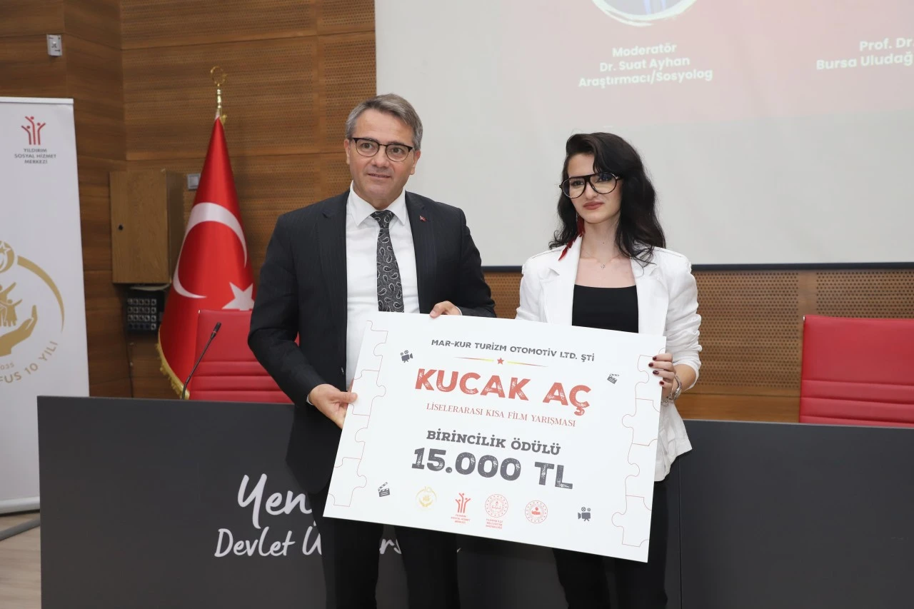 “Kucak Aç