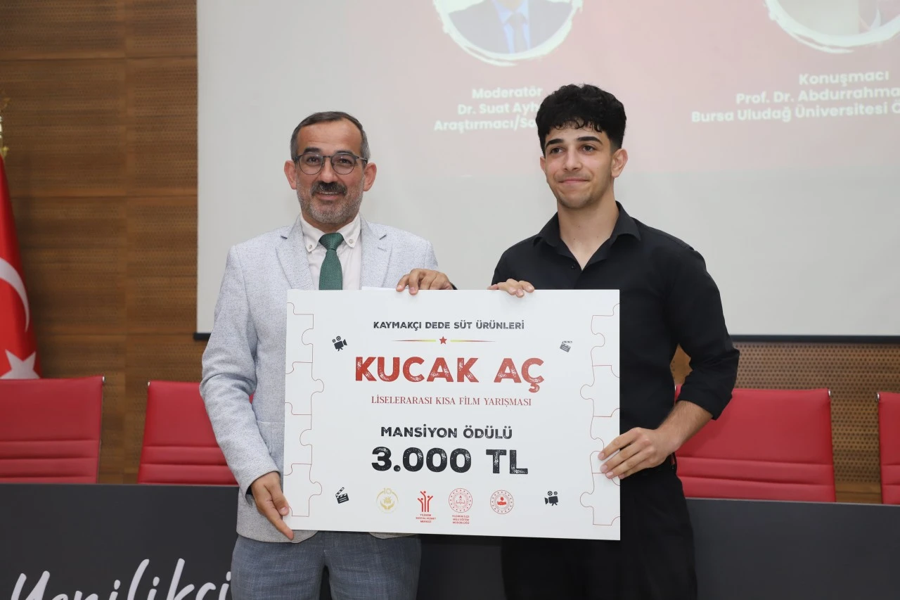 “Kucak Aç
