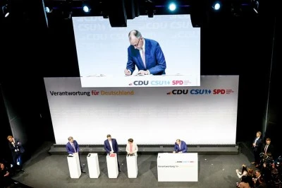 Almanya'da koalisyon h&uuml;k&uuml;meti kuruldu