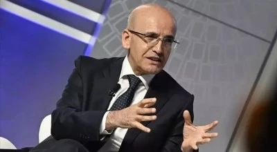 Bakan Şimşek, Katar'da T&uuml;rkiye'deki yatırım fırsatlarını anlattı