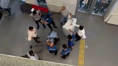 Bankada bı&ccedil;akla soyguna kalkışan ş&uuml;pheli su&ccedil;&uuml;st&uuml; yakalandı