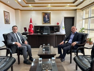 Burhaniye&rsquo;de M&uuml;lkiye Başm&uuml;fettişi &Ouml;ner, kaymakam İlyas Memiş&rsquo;i ziyaret etti
