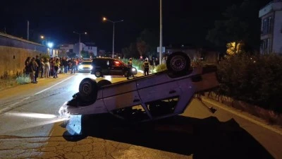 Bursa'da bir otomobil kontrolden &ccedil;ıkarak takla attı