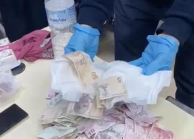 Bursa'da dilencilik parasını &ccedil;ocuk bezine sakladılar