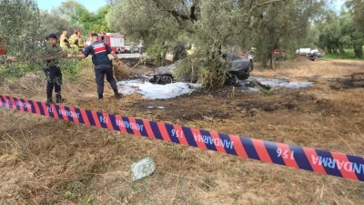 Bursa'da kontrolden &ccedil;ıkan otomobil tarlada yandı: 1 &ouml;l&uuml;, 1'i &ccedil;ocuk 5 yaralı