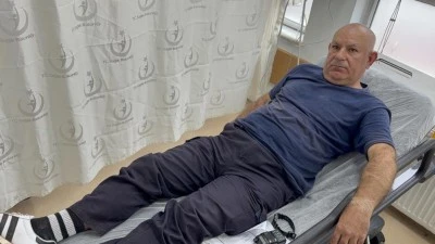  Darbedilen kadını kurtarmak isterken kendisi saldırıya uğradı