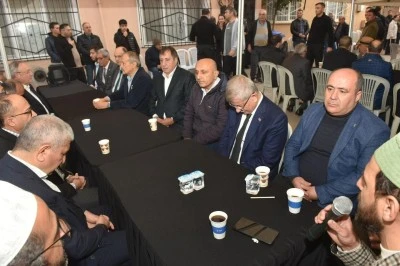 Davutoğlu'ndan Bursalı şehit ailelerine ziyaret