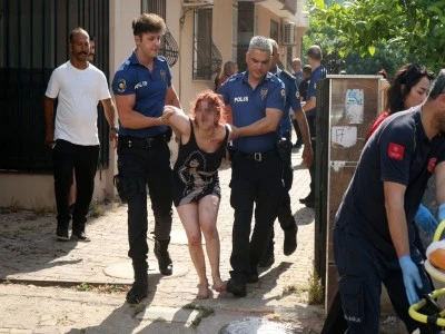 Gen&ccedil; kadın daireyi ateşe verdi kendisini eve kilitledi
