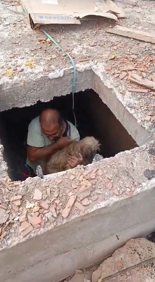 Havuz makine dairesi inşaatına d&uuml;şen k&ouml;peği inşaat &ccedil;alışanları kurtardı
