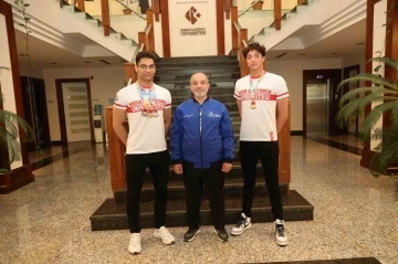 HK&Uuml;&rsquo;l&uuml; milli sporculardan y&uuml;zmede &ccedil;ifte başarı
