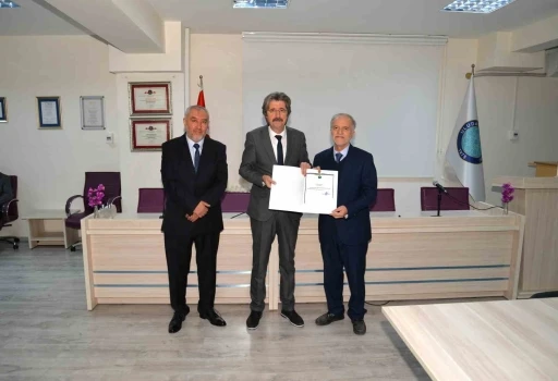 İlahiyat Fak&uuml;ltesinde bayrak değişimi