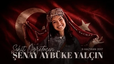 İletişim Başkanı Duran, şehit &ouml;ğretmen Şenay Ayb&uuml;ke Yal&ccedil;ın'ı andı