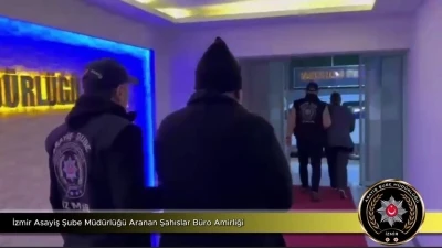 İzmir&rsquo;de 9 yıldır aranan dolandırıcılıktan 28 yıla h&uuml;k&uuml;ml&uuml; &ccedil;ift aynı adreste yakalandı