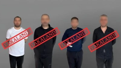 Kırmızı b&uuml;ltenle aranan 4 zanlı G&uuml;rcistan&rsquo;da yakalanarak T&uuml;rkiye&rsquo;ye iade edildi