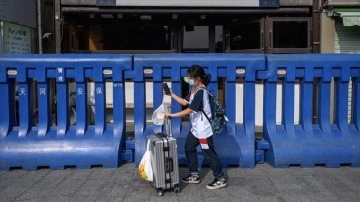 Kovid-19 tedbirlerini gevşeten &Ccedil;in, 'mobil seyahat kartı' uygulamasını kaldırıyor