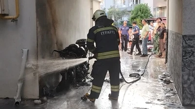 Menteşe&rsquo;de park halindeki motosiklet alev aldı