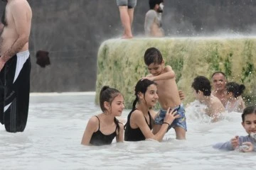 Pamukkale değil Bursa...&Uuml;cretsiz termal su ve &ccedil;amur i&ccedil;in akın akın geliyorlar