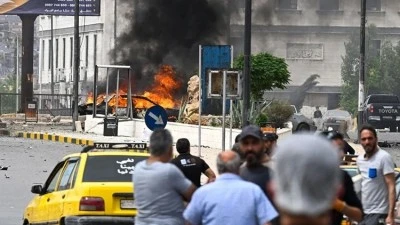 Şam'daki &ccedil;ifte patlamada 4'&uuml; polis 18 yaralı