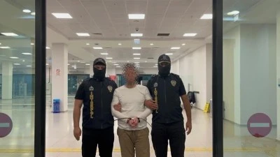 Su&ccedil; &ouml;rg&uuml;t&uuml; elebaşı Serkan Kurtuluş, Arjantin'de yakalanıp T&uuml;rkiye'ye getirildi
