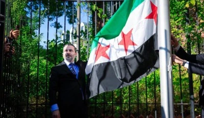 Suriye bayrağı, Washington'daki b&uuml;y&uuml;kel&ccedil;ilikte g&ouml;ndere &ccedil;ekildi