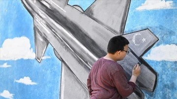 Teknoloji ve karikat&uuml;r meraklısı otizmli Taha, &ccedil;ocuklara ilham vermek istiyor