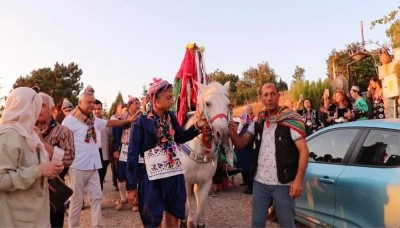 Uludağ &Uuml;niversitesi &ouml;ğretim &uuml;yeleri Orhaneli'de T&uuml;rkmen d&uuml;ğ&uuml;n&uuml;yle hayatlarını birleştirdi