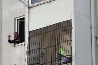 Yakalanacağını anlayınca el bombası alıp kendisini eve kilitledi